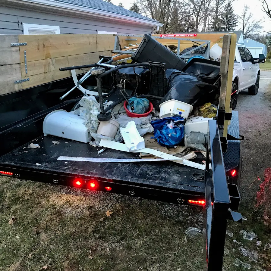 Roll-off dumpster delivered to a residential driveway in Dock Junction