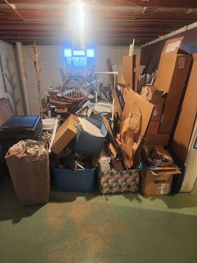 Roll-off dumpster container at job site for 15 Yard Dumpster Rental in Dock Junction